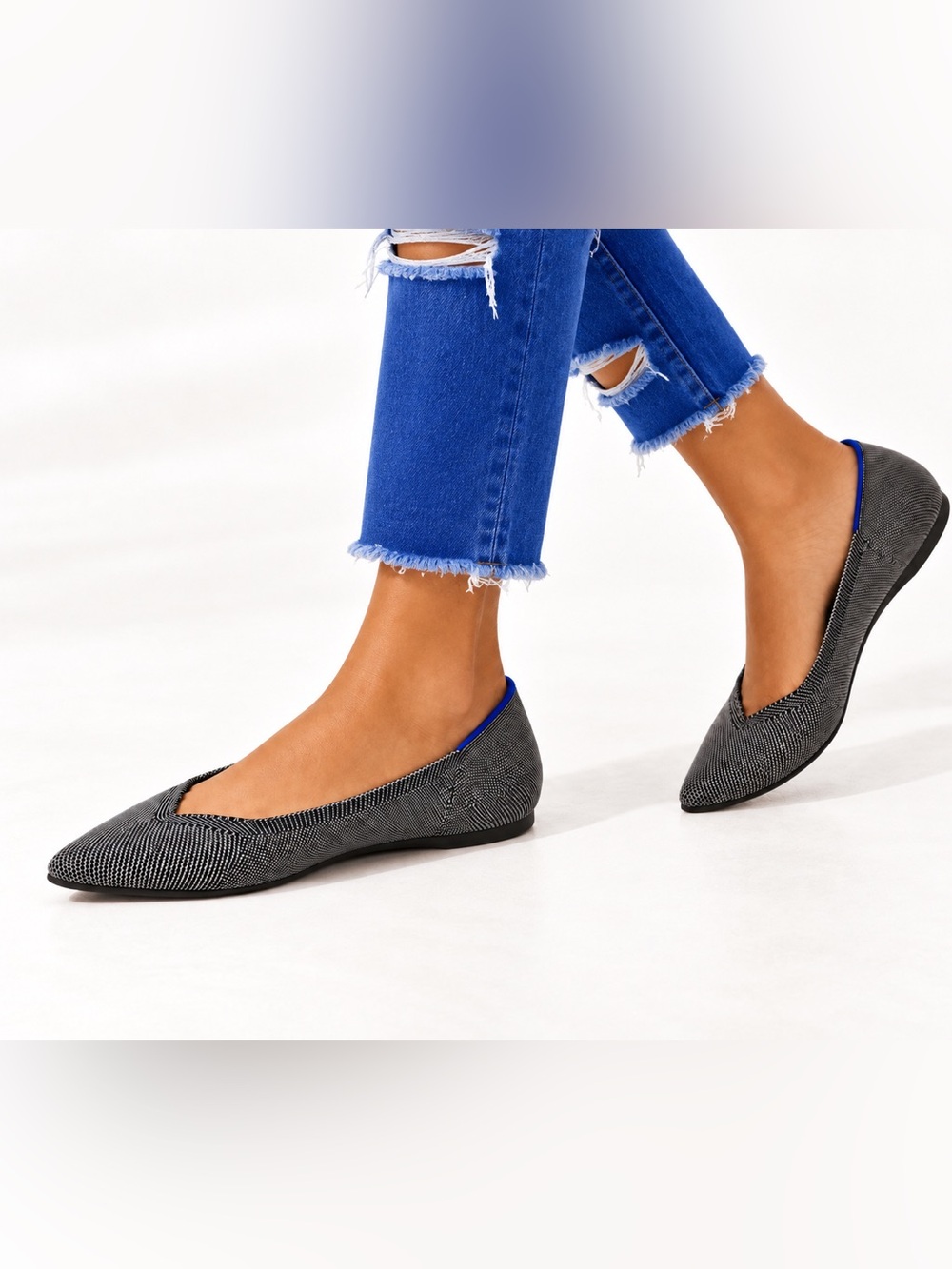 Rothy's Pointed Ballet Flats in Black and Blue Trim